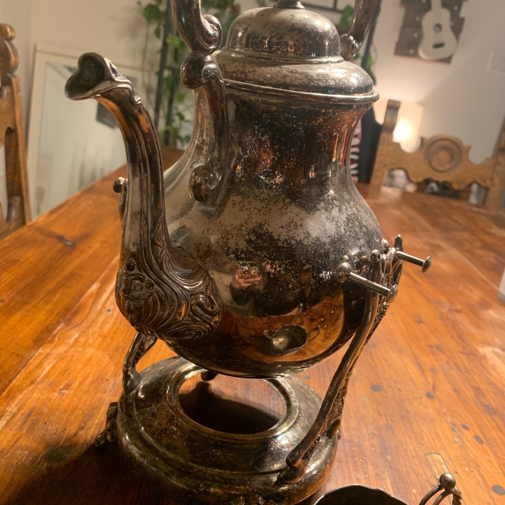 Elegant Silver Teapot with Stand